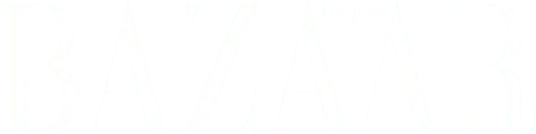 Girl wearing headphones noting something on notebook