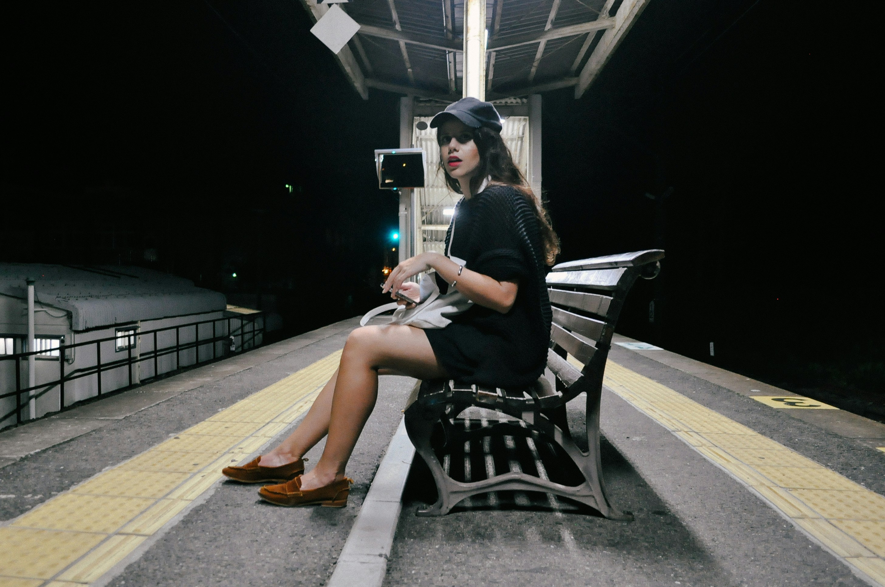 woman waiting for train - Clear Spring Color Analysis