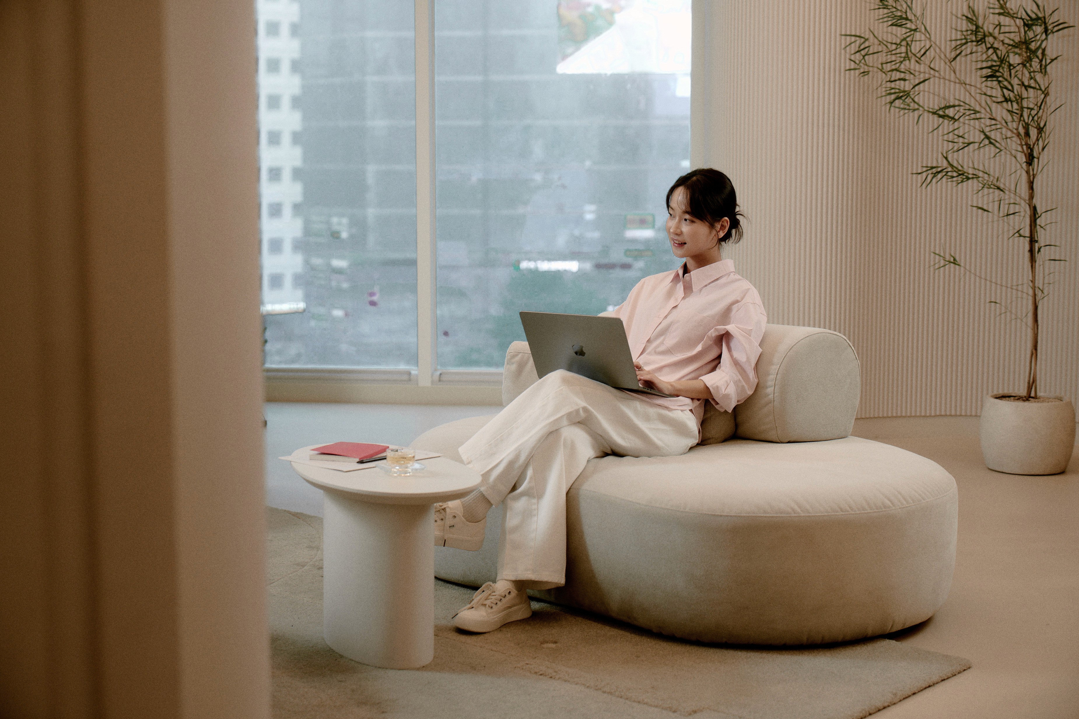 Two students smiling during a language learning session at 612 Academy, reflecting an engaging and human-centered learning experience.