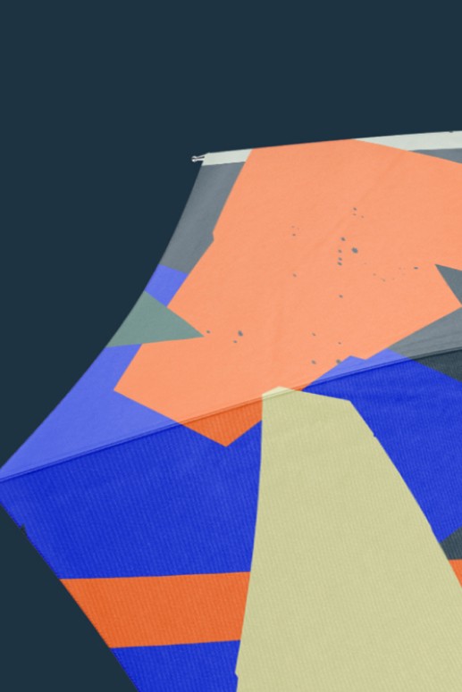 A closeup of an umbrella printed with a Nordic Culture Fund's brand pattern