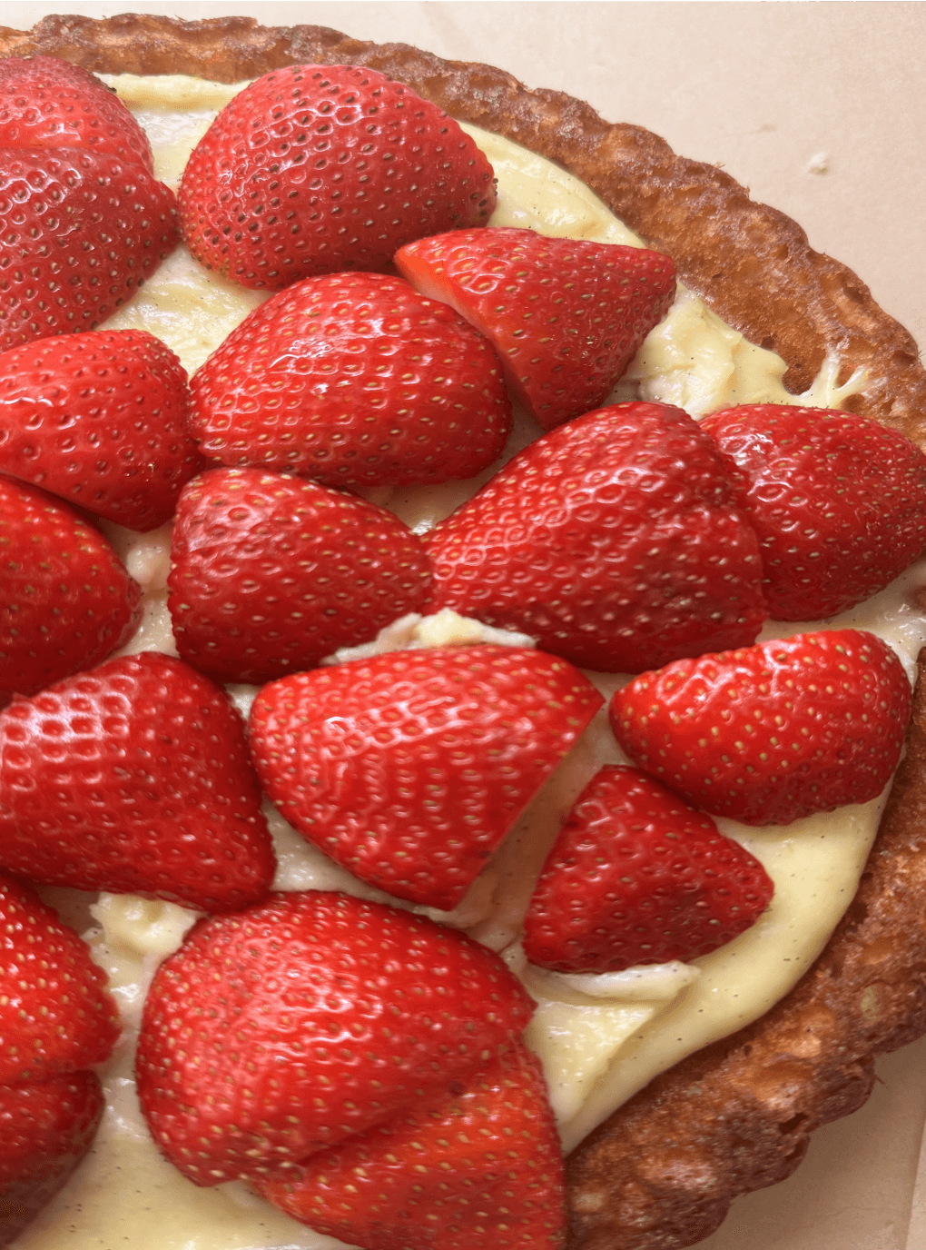 Strawberry cream pie with whole fresh strawberries and sourdough crust