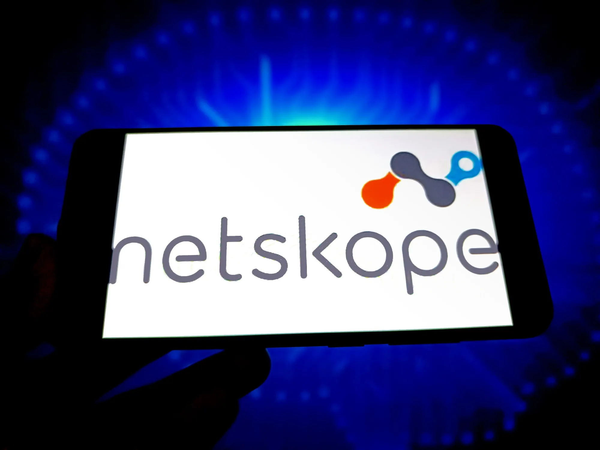 man holding a tablet - Netskope Alternatives