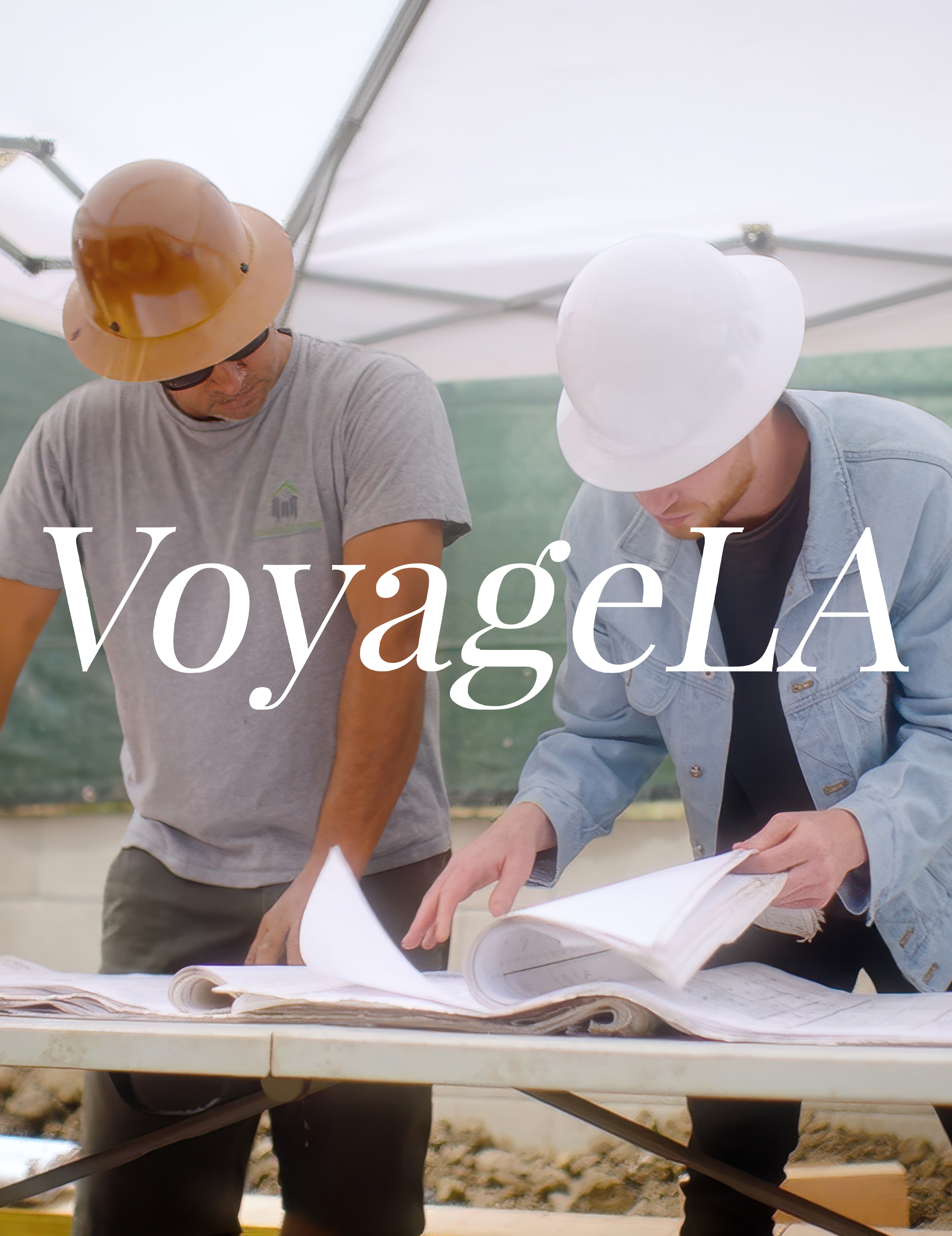 Voyage LA Article for Christopher Hatch McLean architect in LA photo of architect and contractor reviewing plans together on jobsite