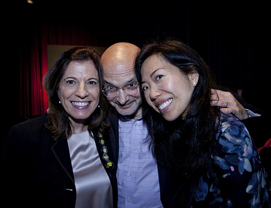 portrait of two women and a man