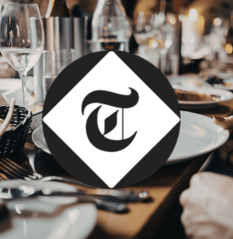 The Telegraph logo over a restaurant dining table