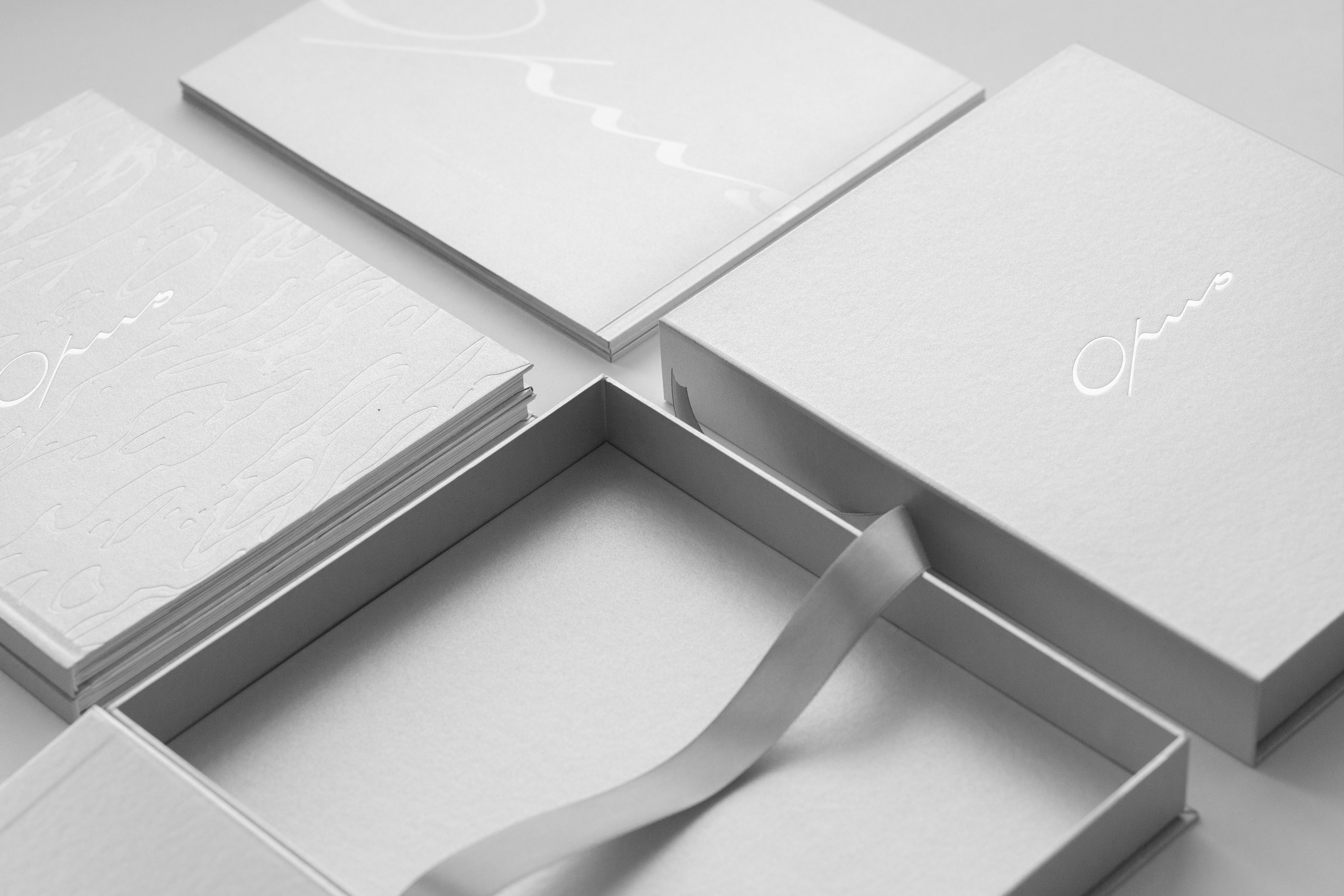 Streetside billboard with flyposters of the Batch.Works brand and illustrations