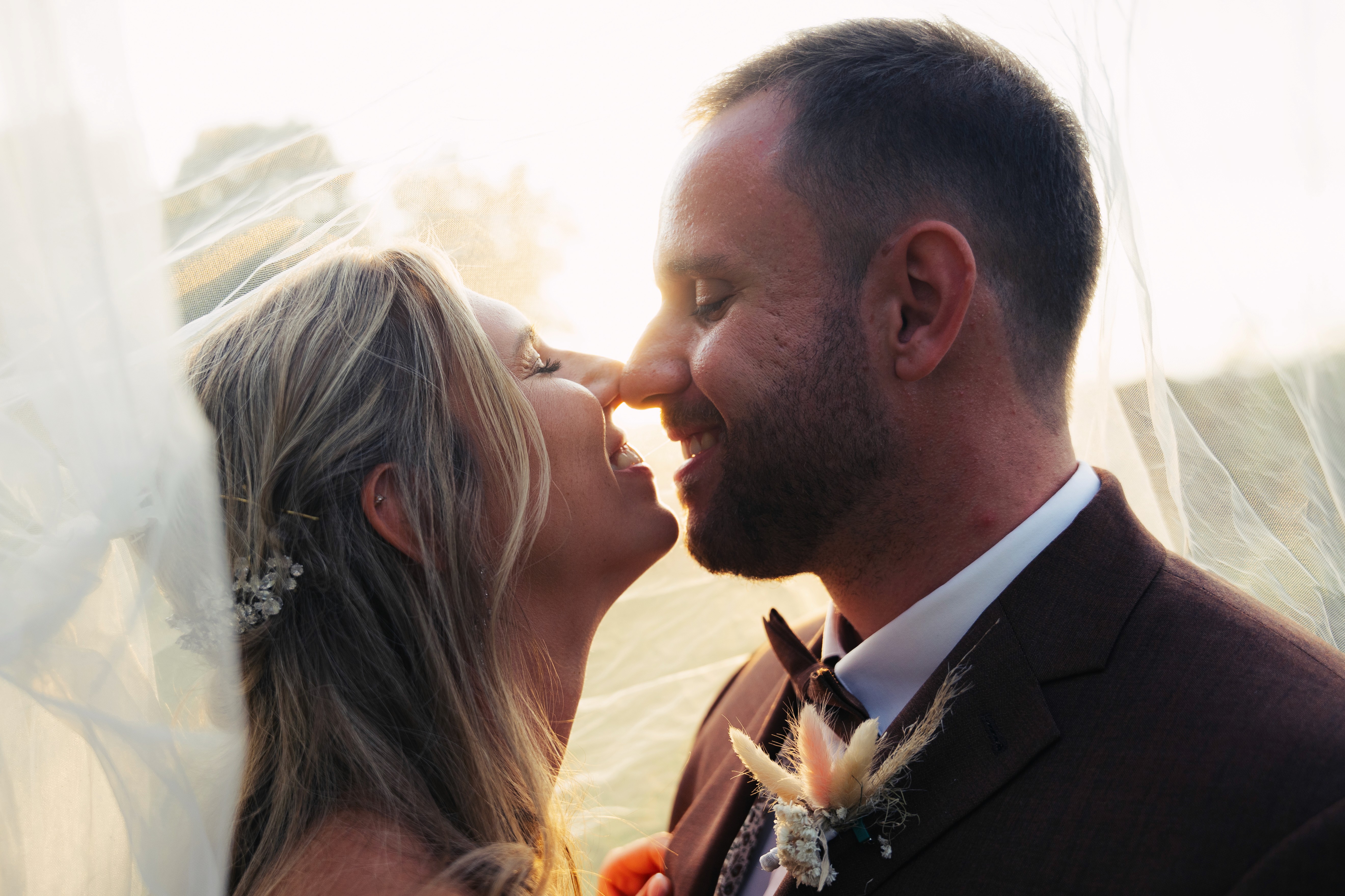 Vintage television with soda cans on grassy field