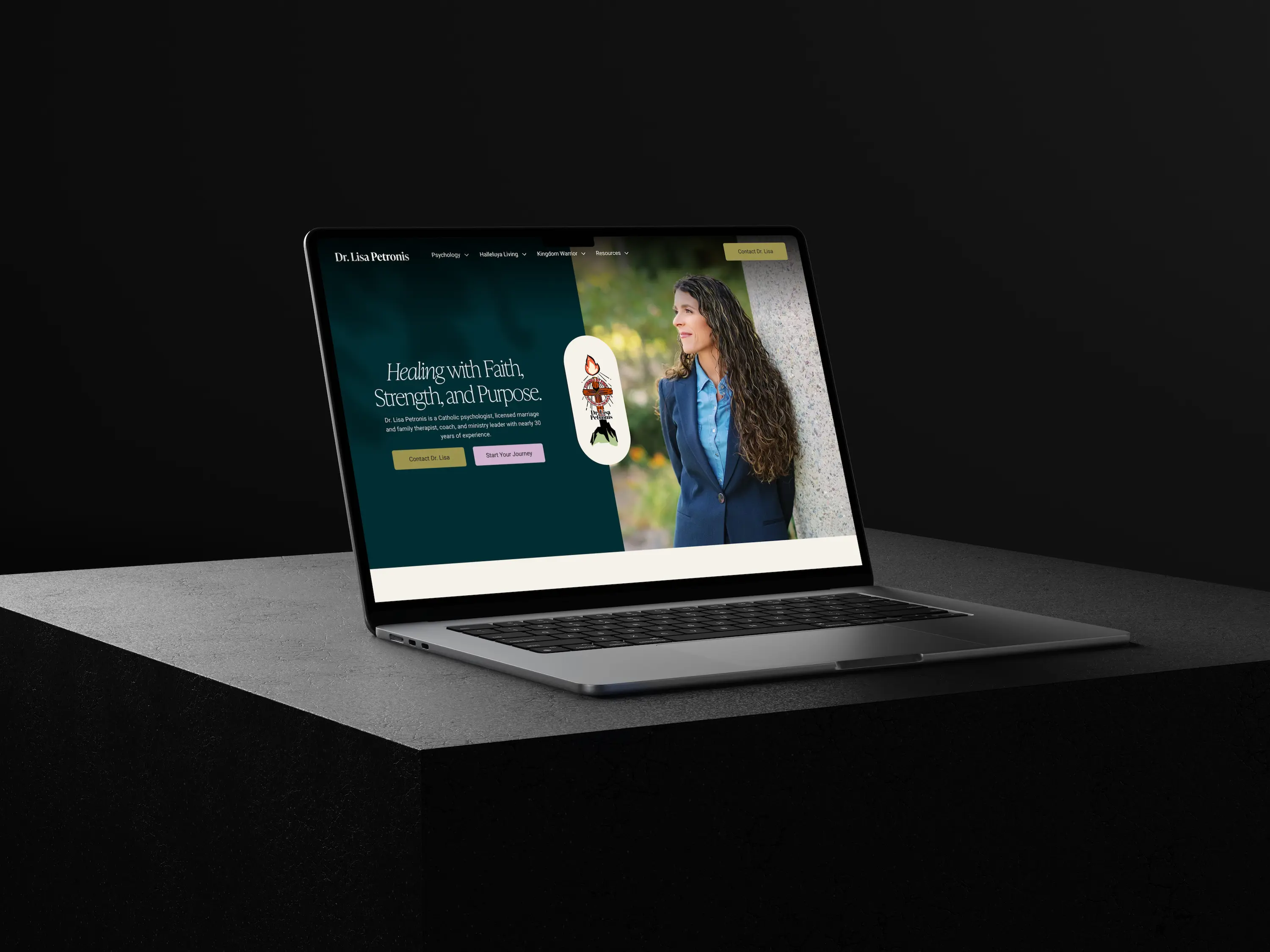 A laptop displaying a colorful website on a dark background, showcasing modern design elements for Dr. Lisa Petronis website.