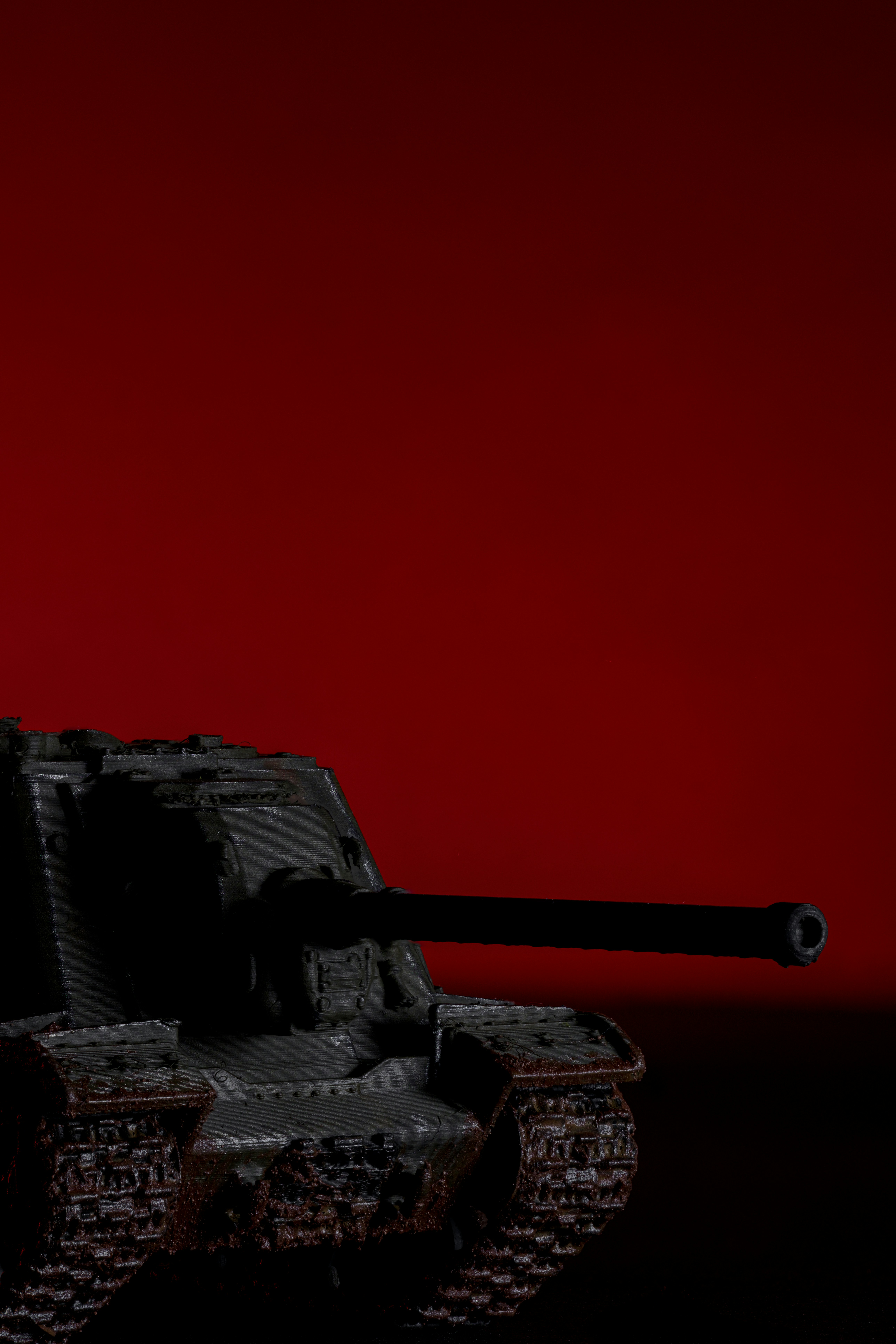 A black and red photo of a tank