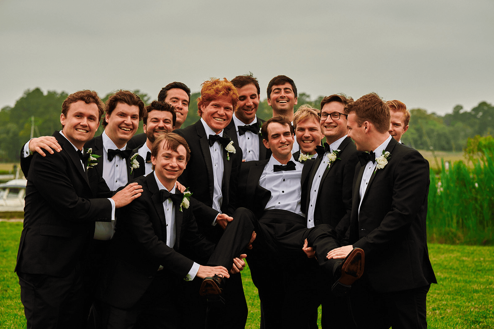 Andrew Gets Lifited up by his groomsmen