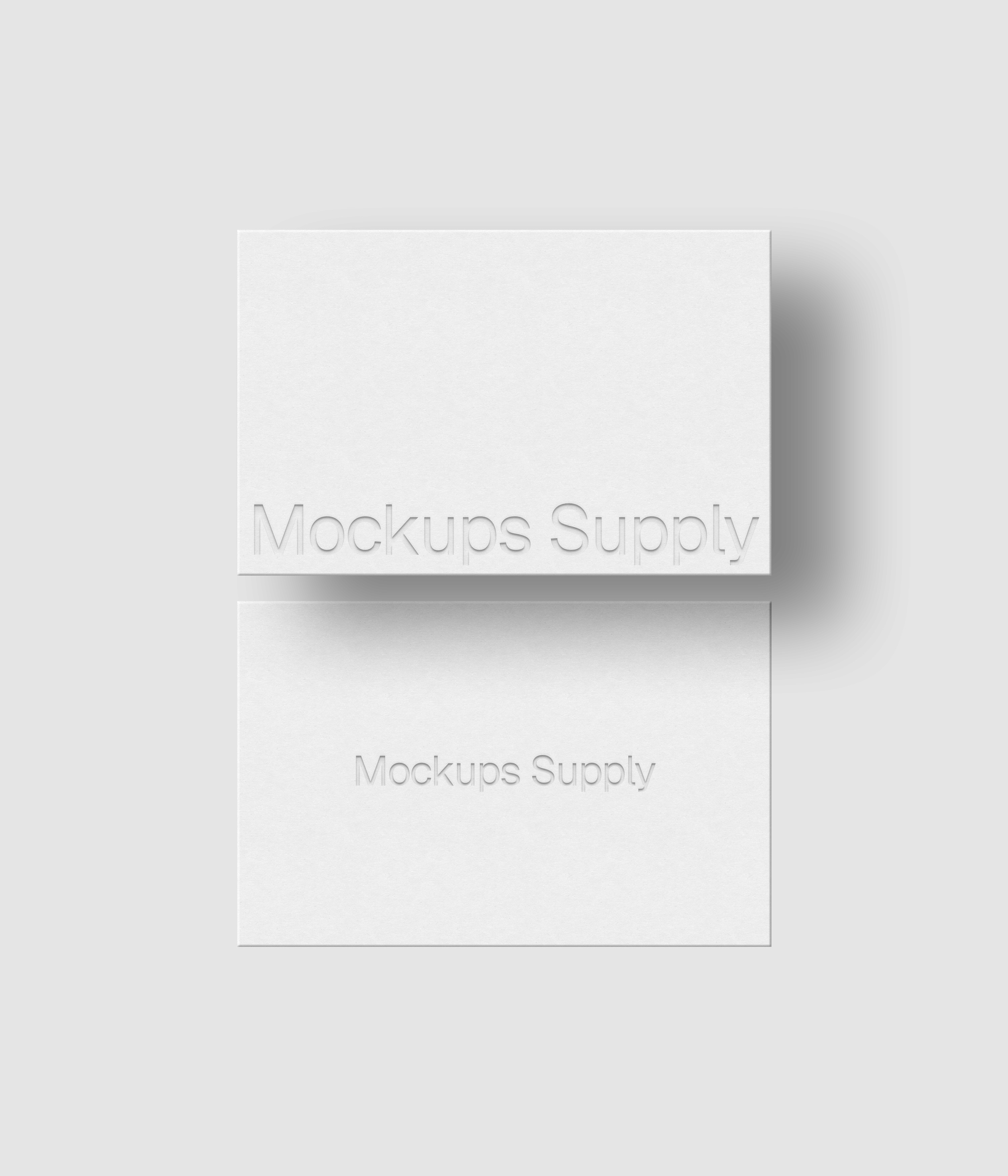 2 European business cards mockup landscape for Photoshop with shadow and debossed text effect, white cards on white background, minimal branding and stationery presentation