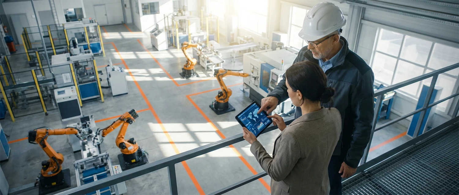 Manufacturing executives reviewing industrial project success and de-risking the B2B buying process in a Denver aerospace facility.
