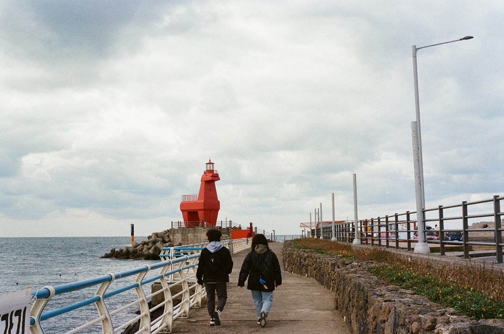 a pair of cell phones on a concrete block