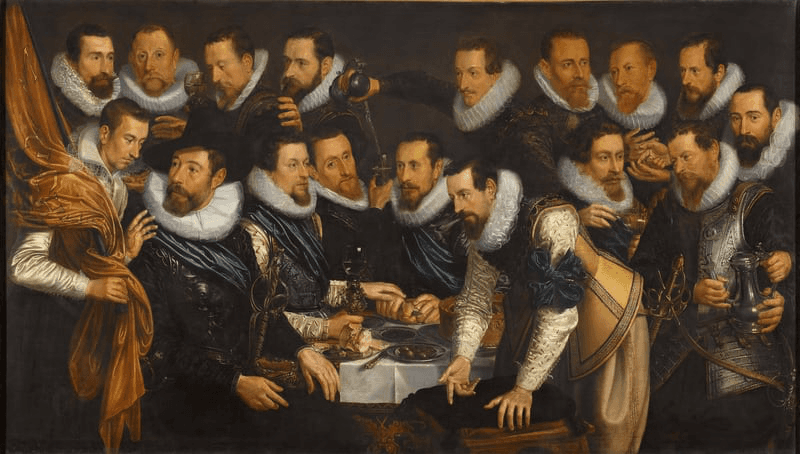 Group portrait of men in dark clothing with white collars, arranged in a dynamic, formal composition.