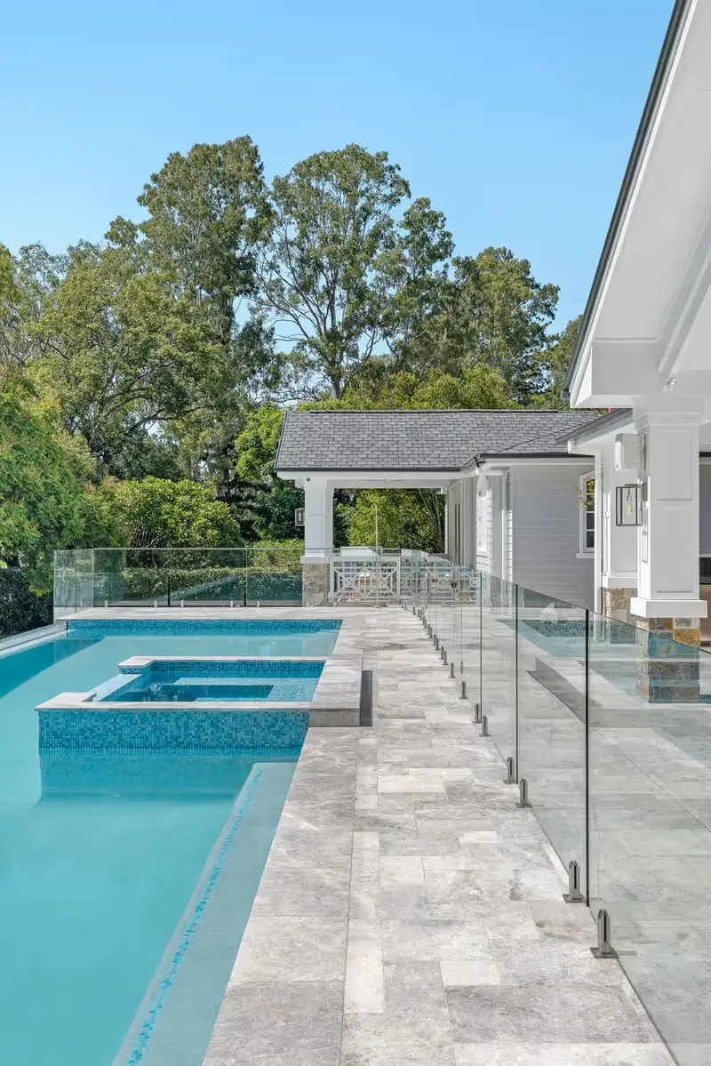 Outdoor view of the pool at Jacaranda House