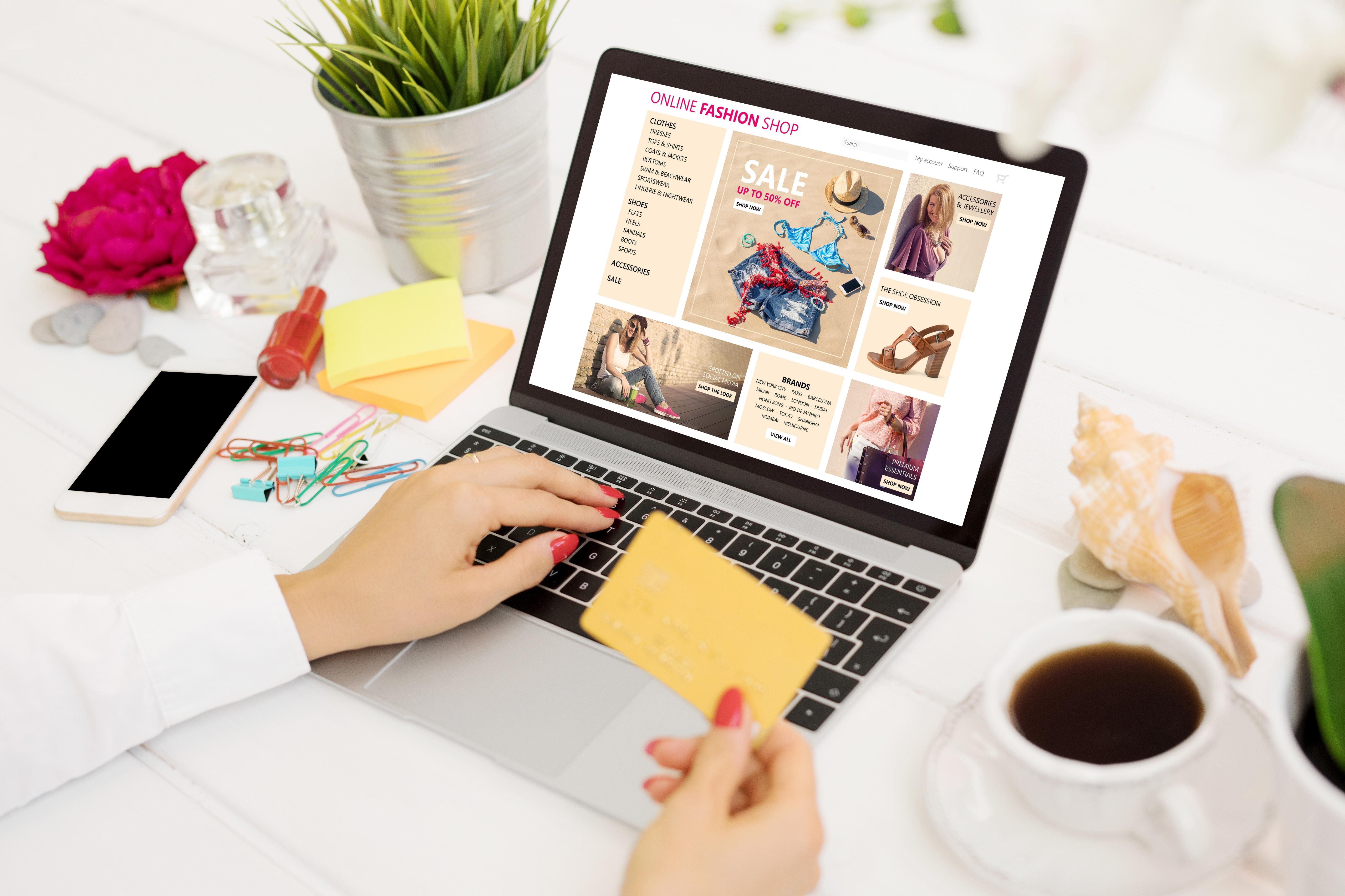 A shopper surfing online and paying with credit card