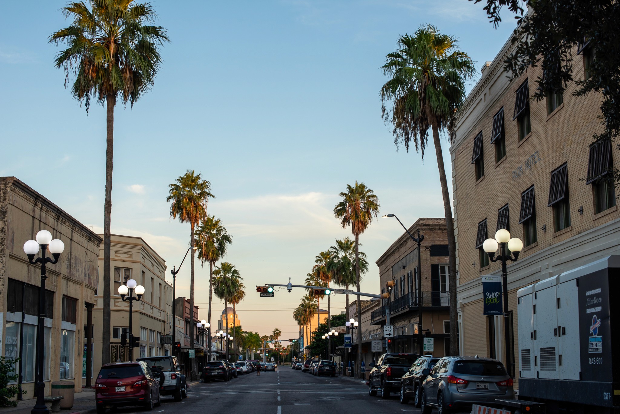 two people in kayaks paddling on the water