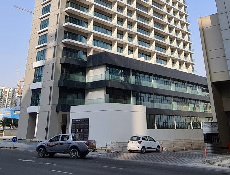 Contemporary residential or commercial tower exterior, expert real estate consulting for luxury properties.