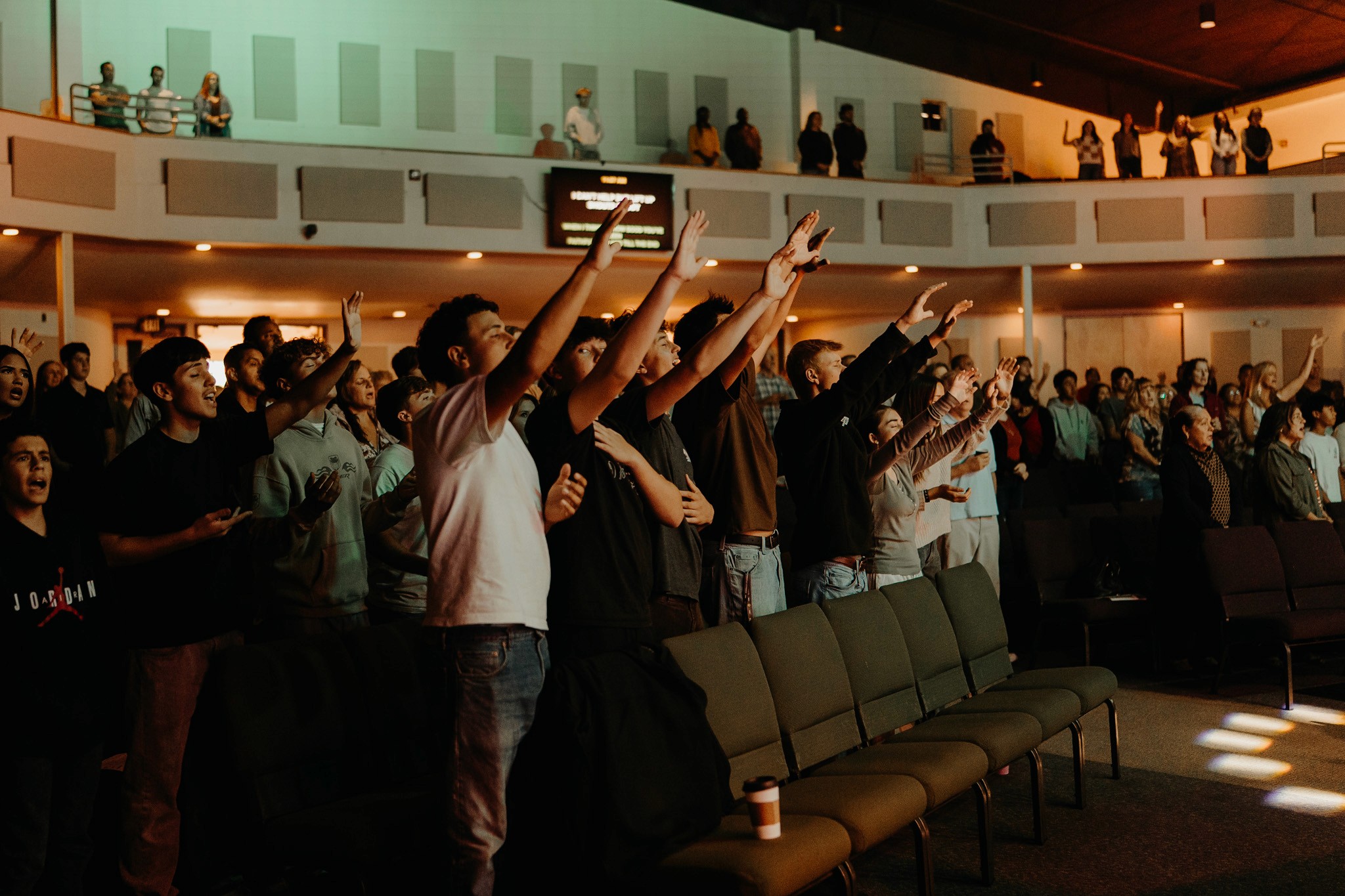 husband and wife working happily on a laptop