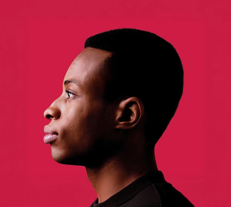 profile image of a black man on a red background