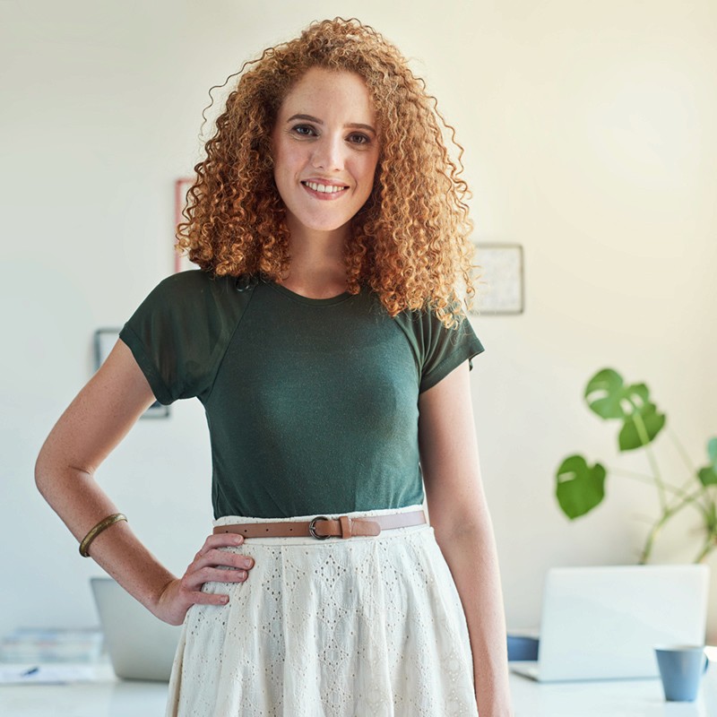 a man in a blue suit posing for a picture