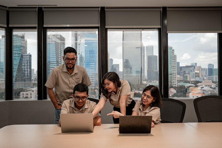 Asian professionals collaborating in a modern workplace