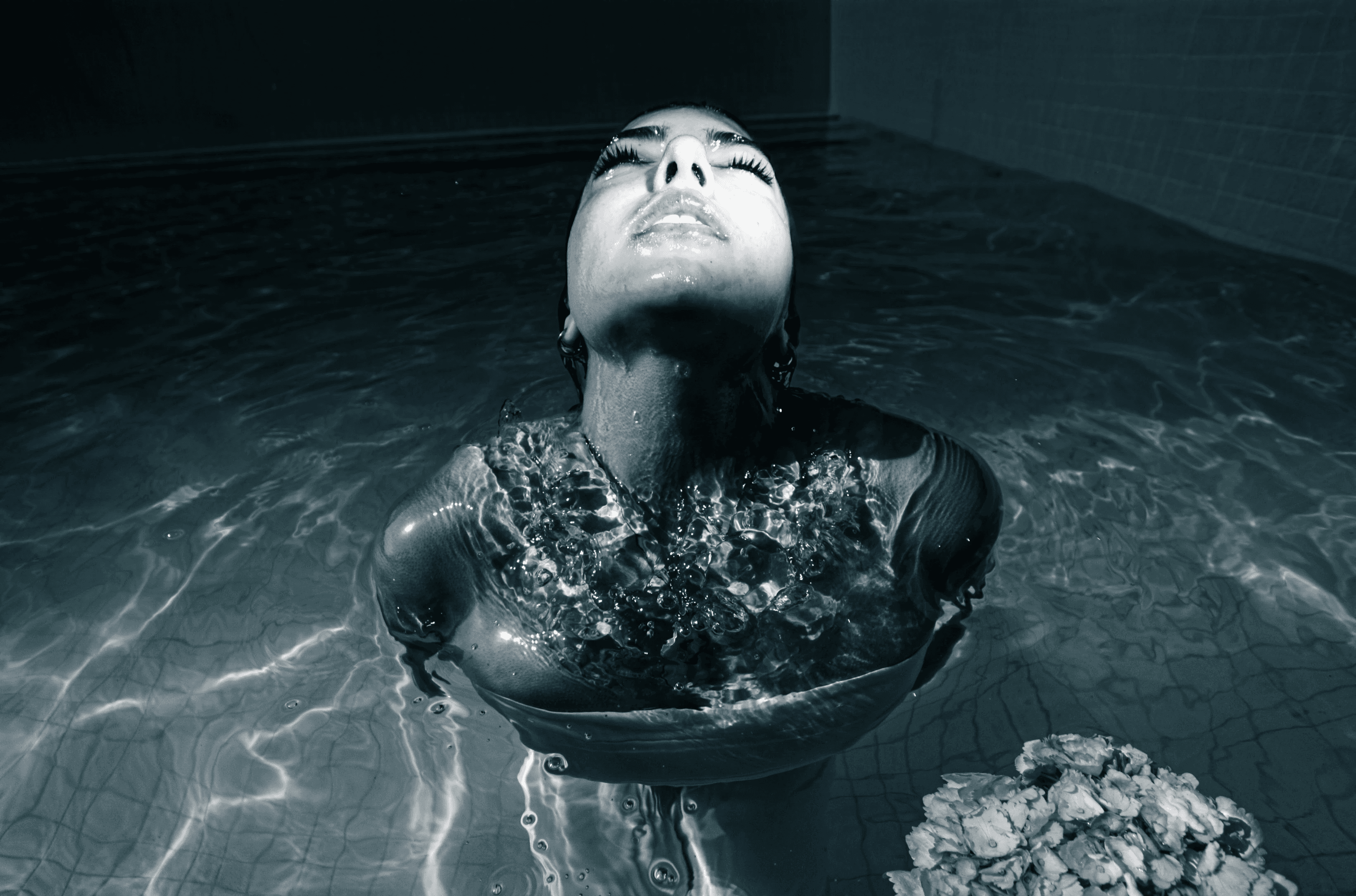 Stack of books with modern publishing design placed on bright white stairs