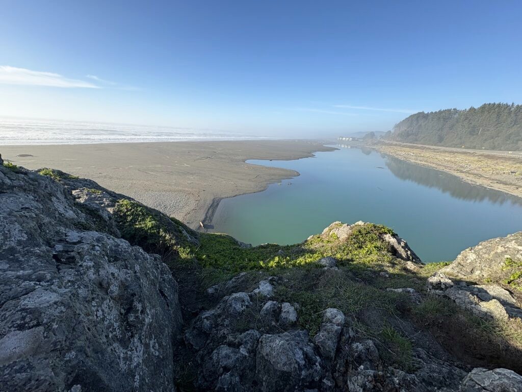 Aerial view of the Hunter Creek estuary meeting the ocean near Gold Beach, Oregon