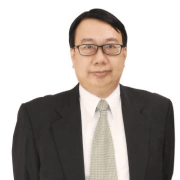 smiling man wearing black turtleneck shirt holding camrea