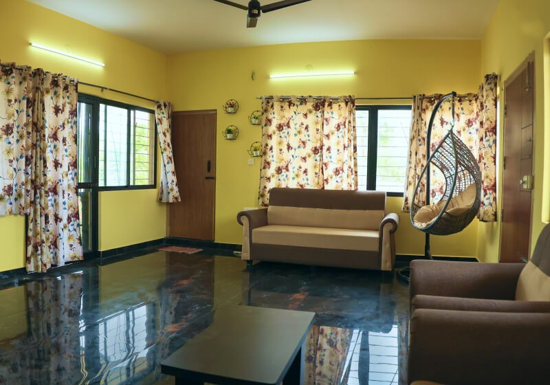 A flower-filled ring floats in fluffy clouds.