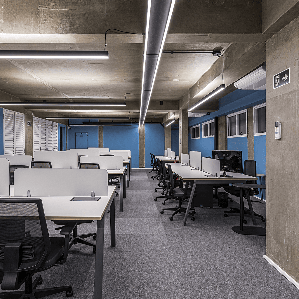 Stacked square glass jars filled with golden serum and bubbles, silver lids—luxury skincare packaging on a light background.