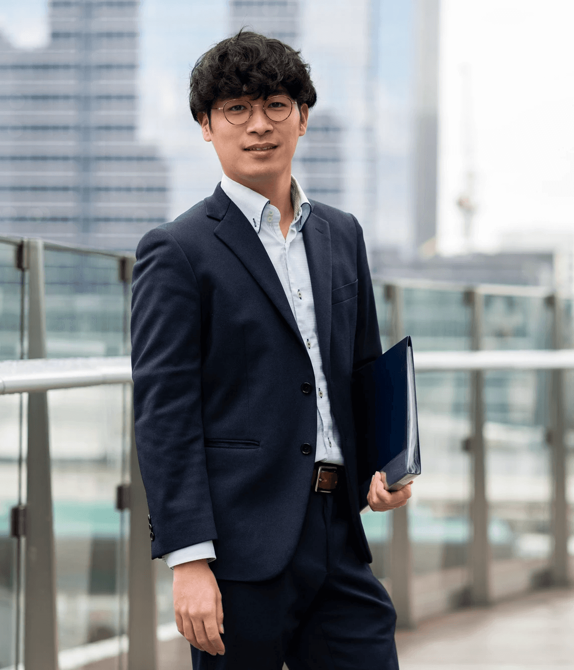 woman sitting around table holding tablet