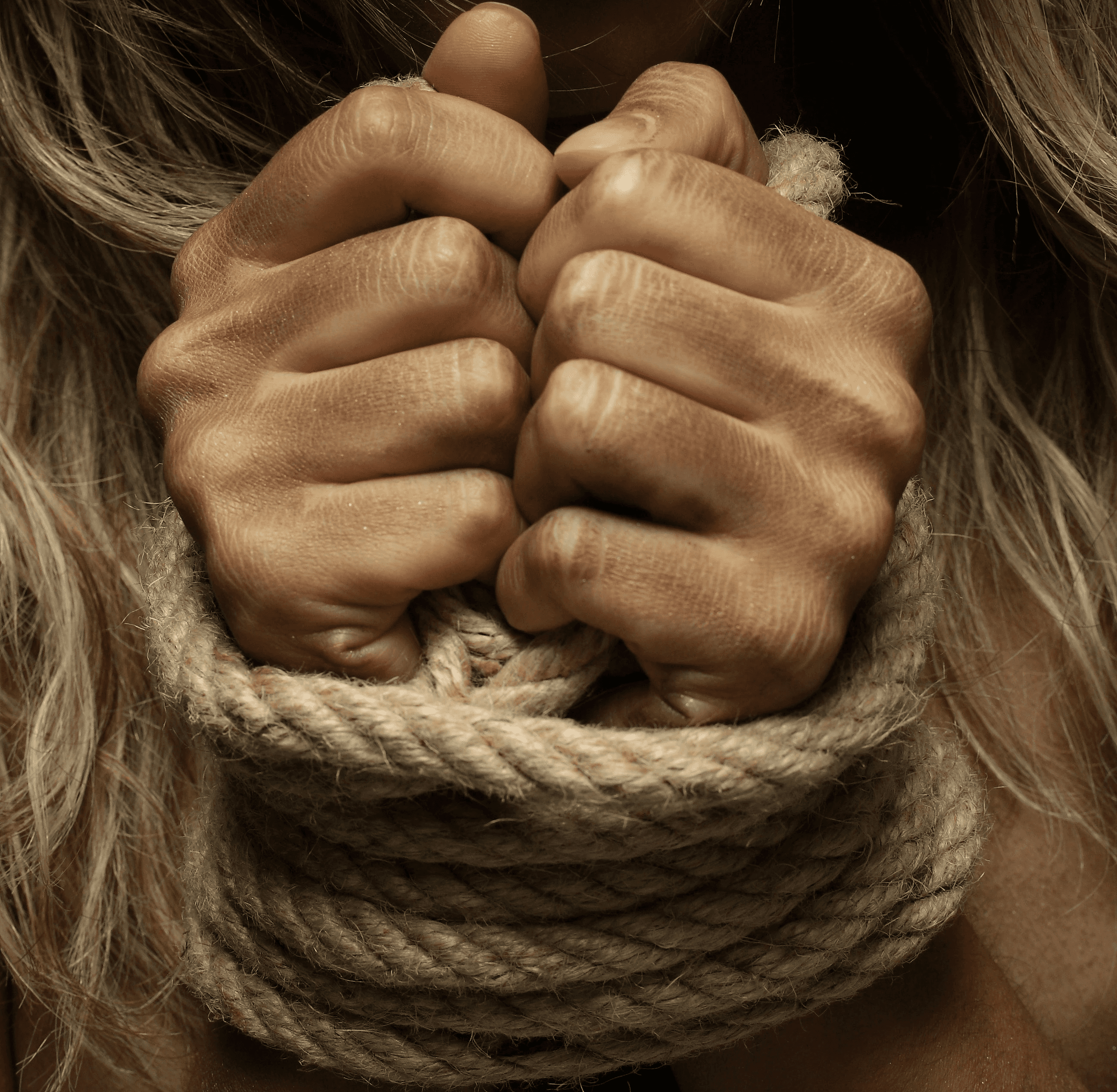 woman with hands tied