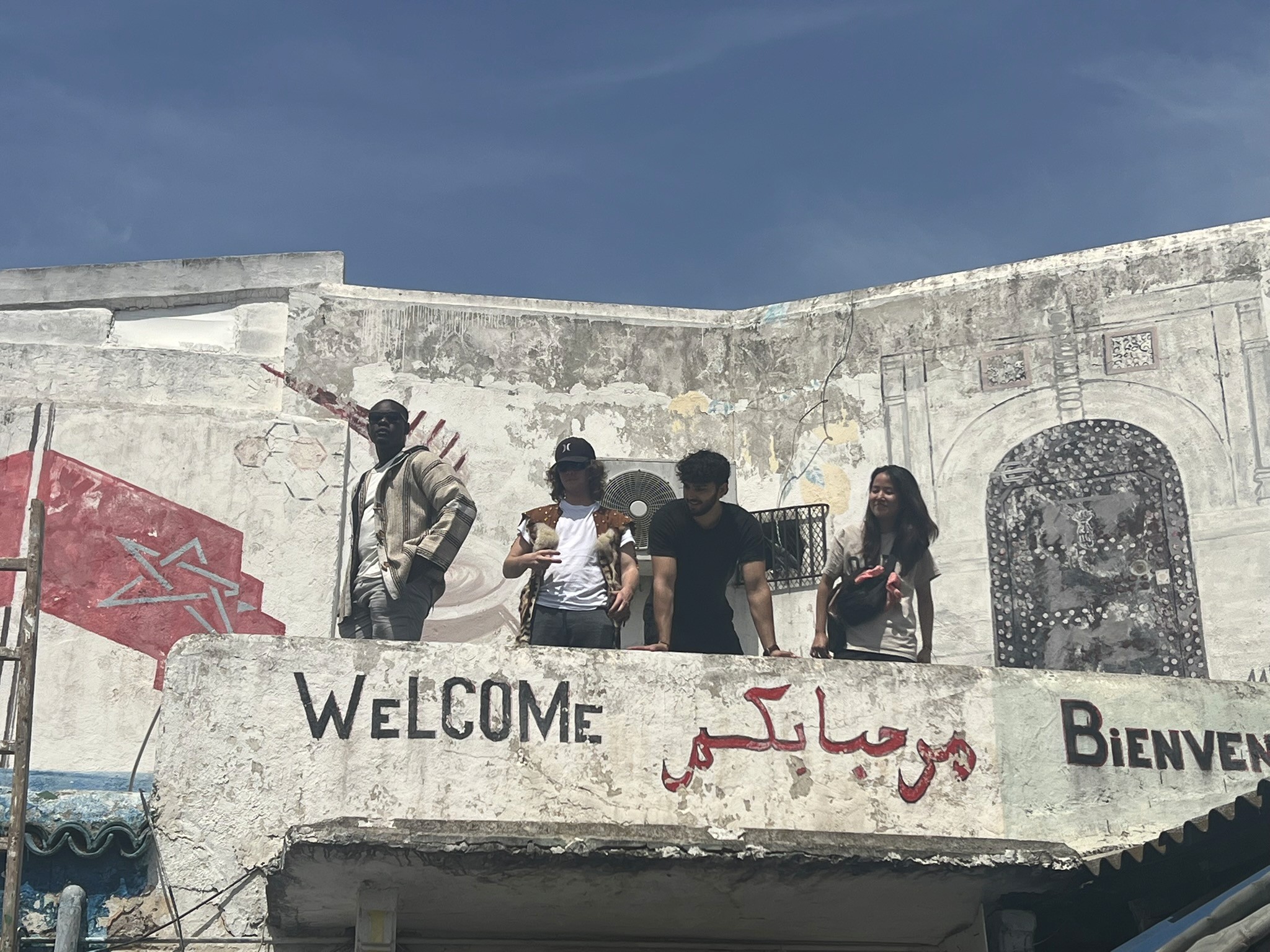 woman in black blazer smiling