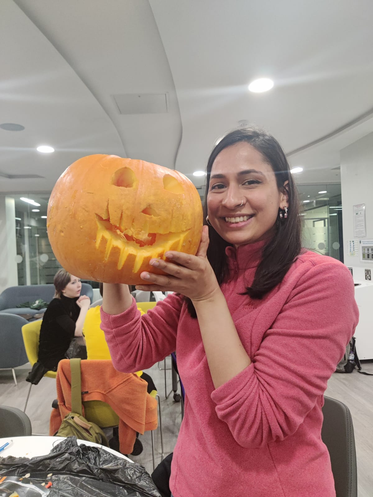 A young girl smiling