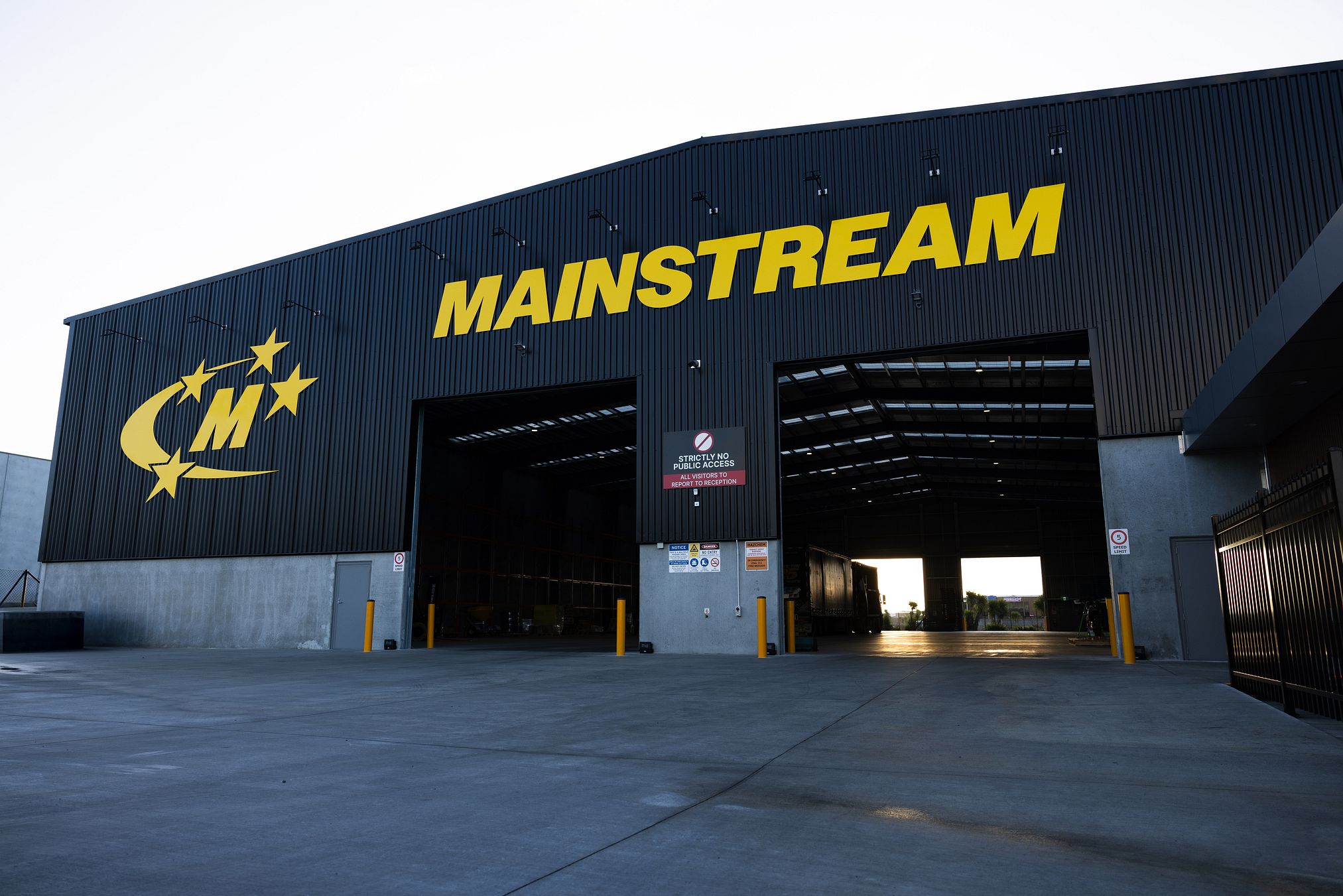 Modern glass building reflected in angled grid lines