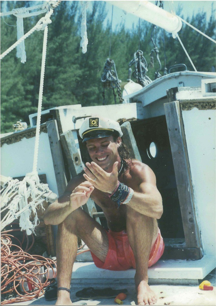 Ty in his captain's hat aboard the Peregrine