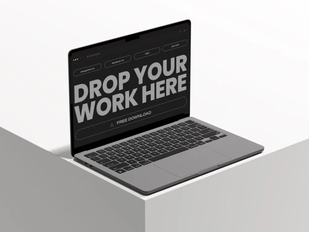 MacBook Air mockup in space gray, displayed on the corner of a minimalist white surface. The screen shows placeholder content with bold text, set against a clean, modern background.