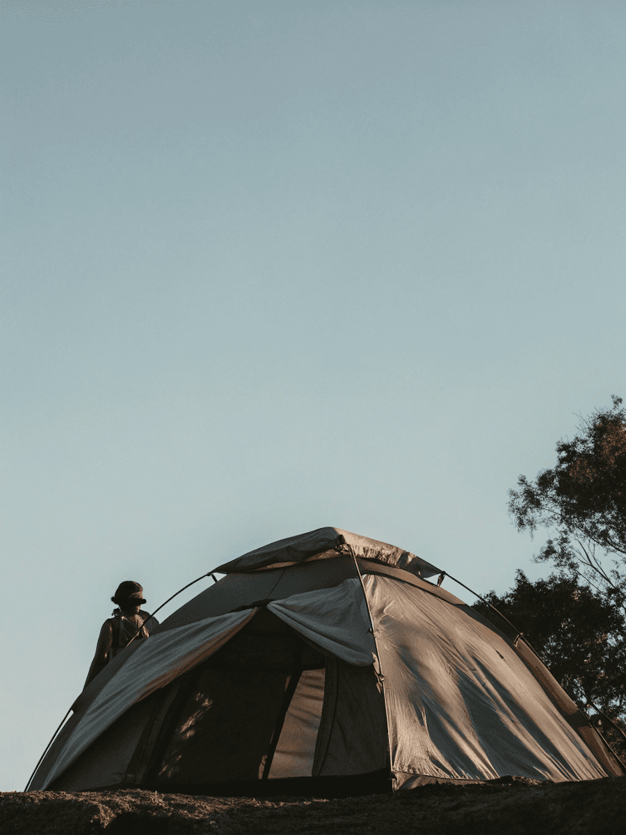 beach under blue sky and white clouds during daytime