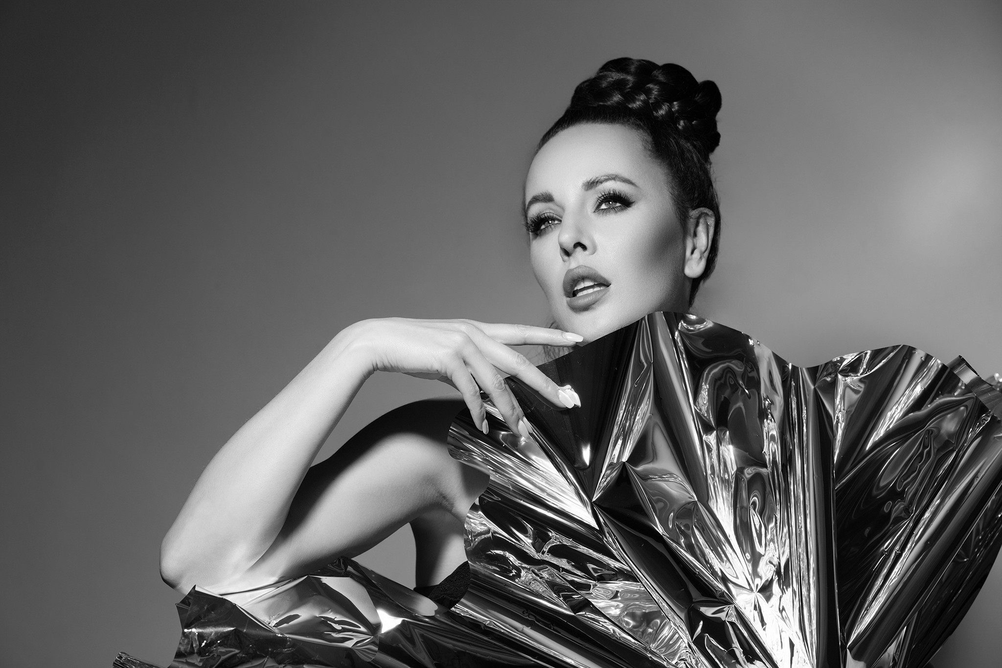 Woman against metallic chrome surface, skin and shine contrast, black and white fine art — Chrome series by Agnieszka Czyzkowska