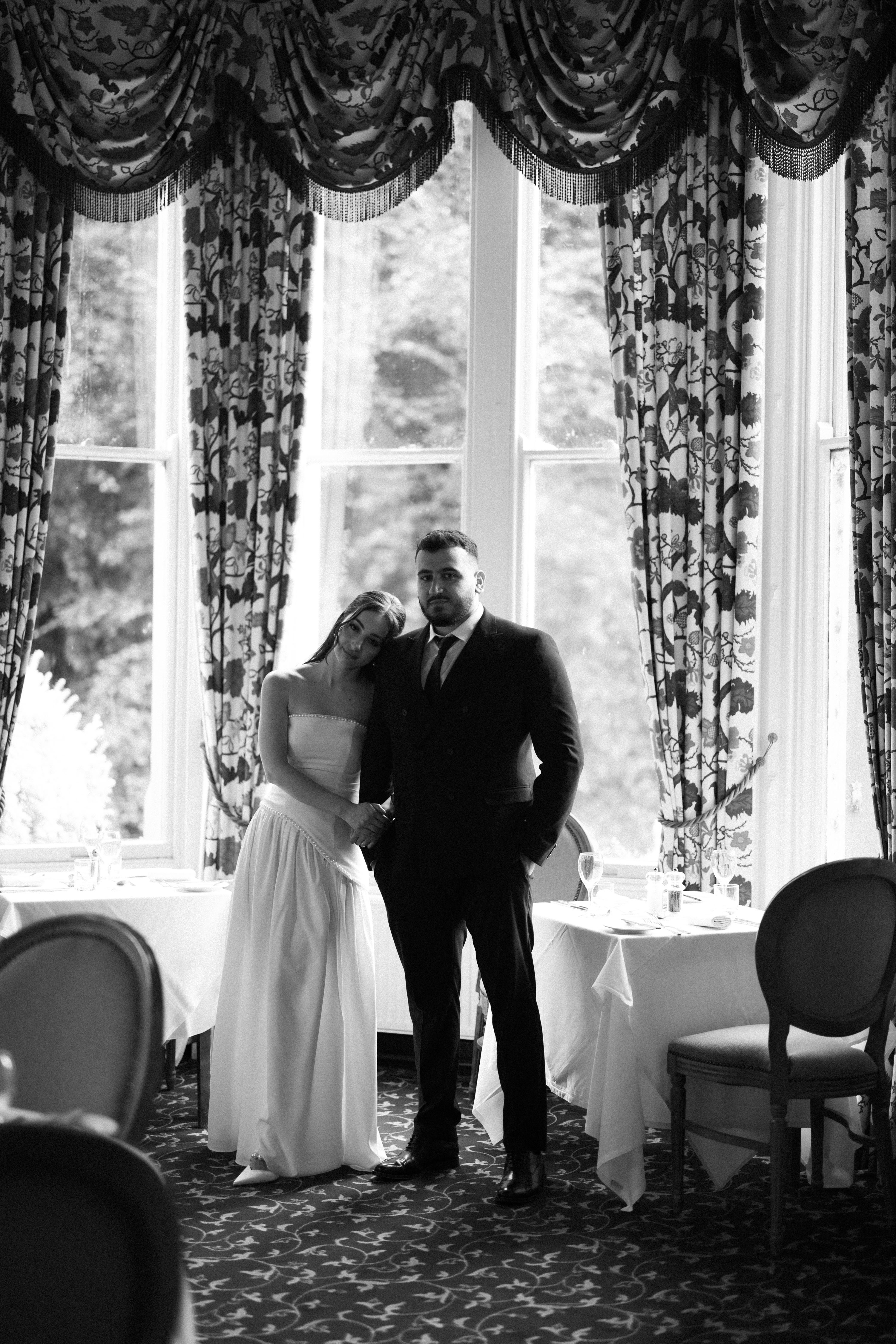 woman in white coat smiling