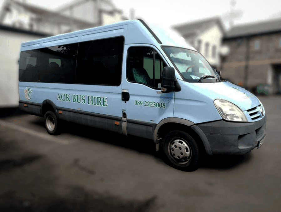 AOK Mini Bus Hire on the side of a Minibus