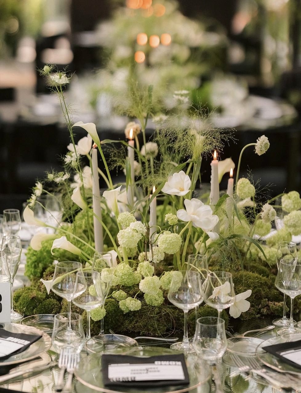 three white taper candles