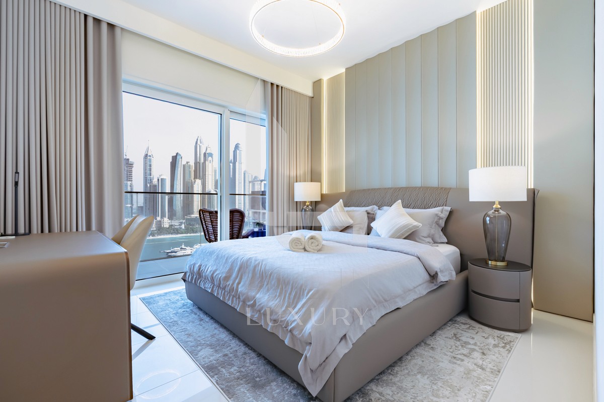 Welcome to this master bedroom, featuring a dedicated workspace table.