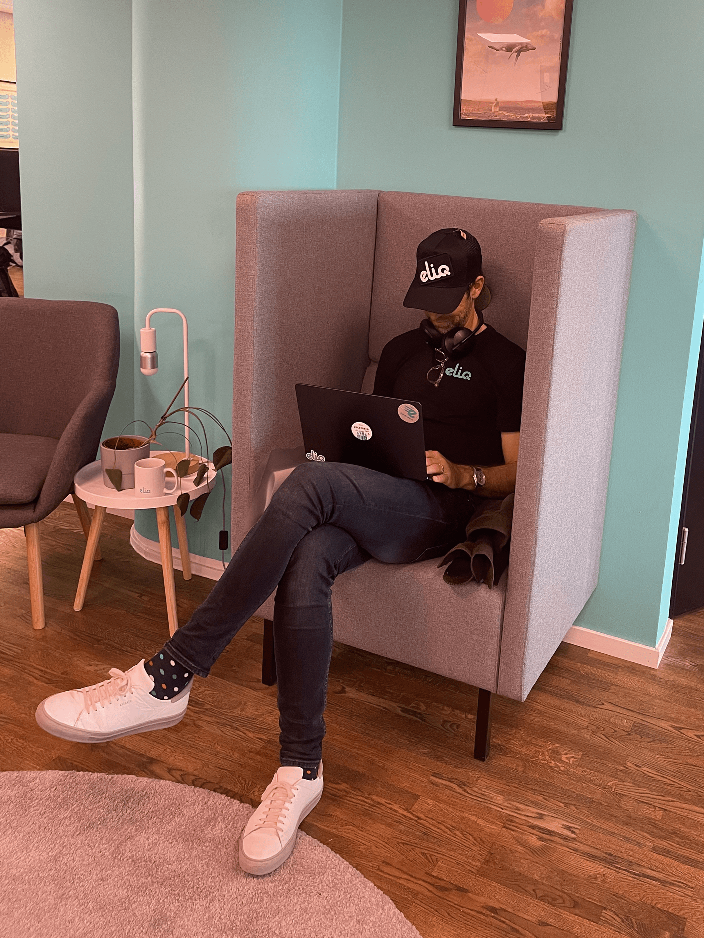 Barista in cafe pouring coffee