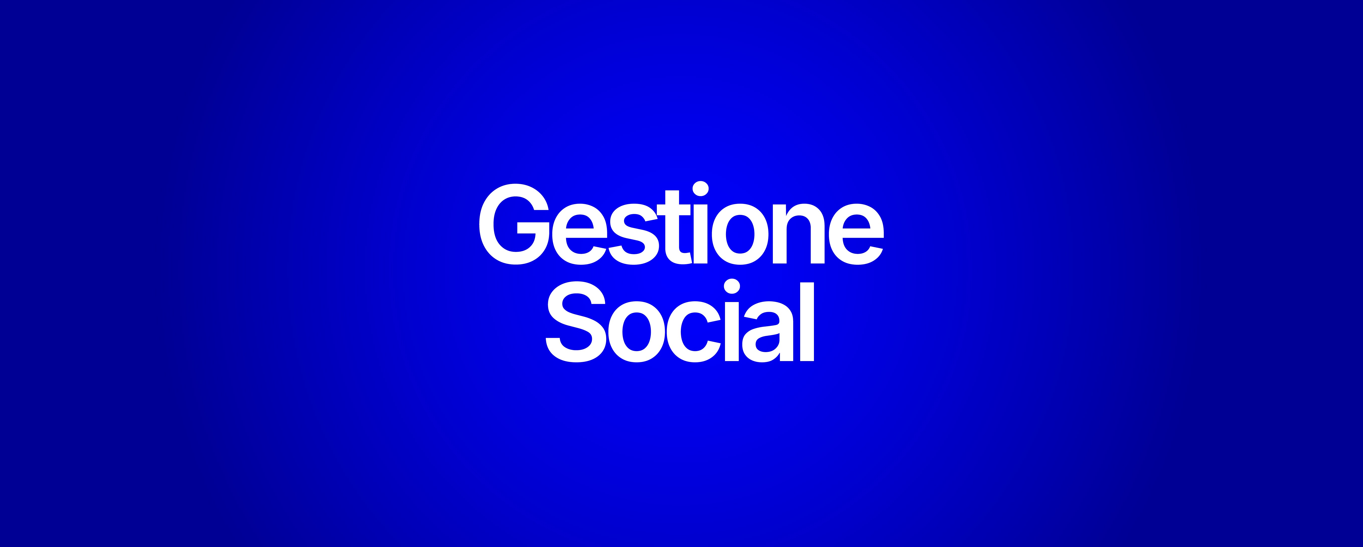 A woman sitting at a table using a laptop computer