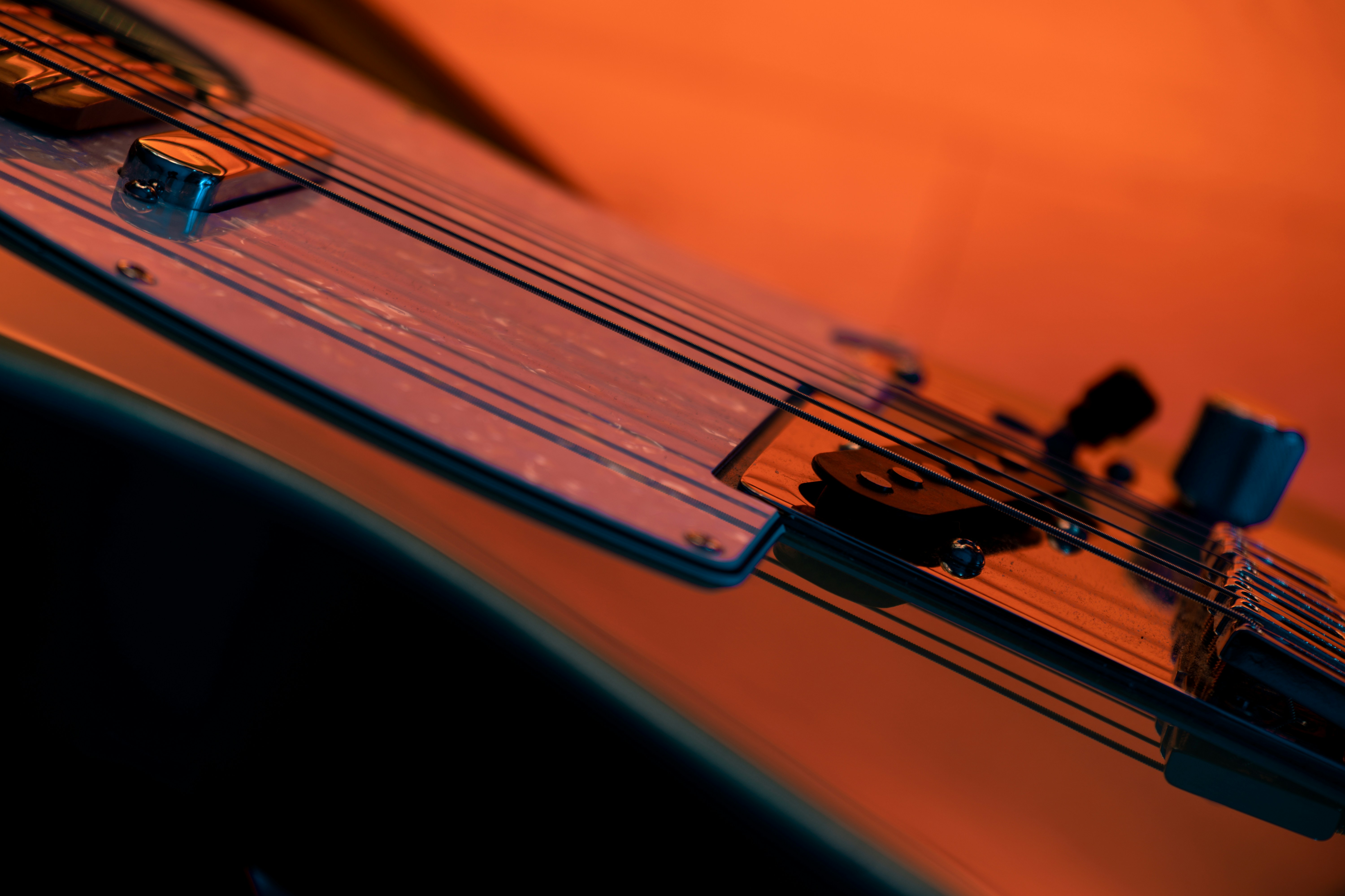 Man fretting a guitar