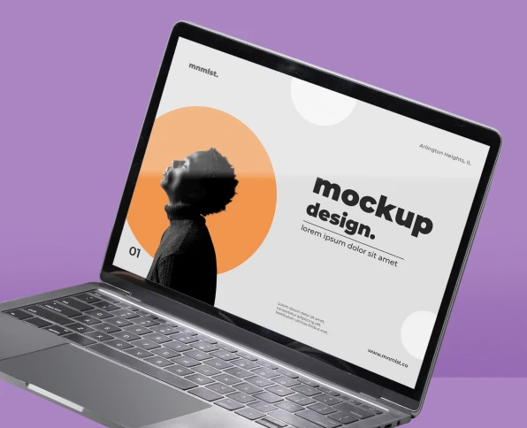 a laptop with purple background