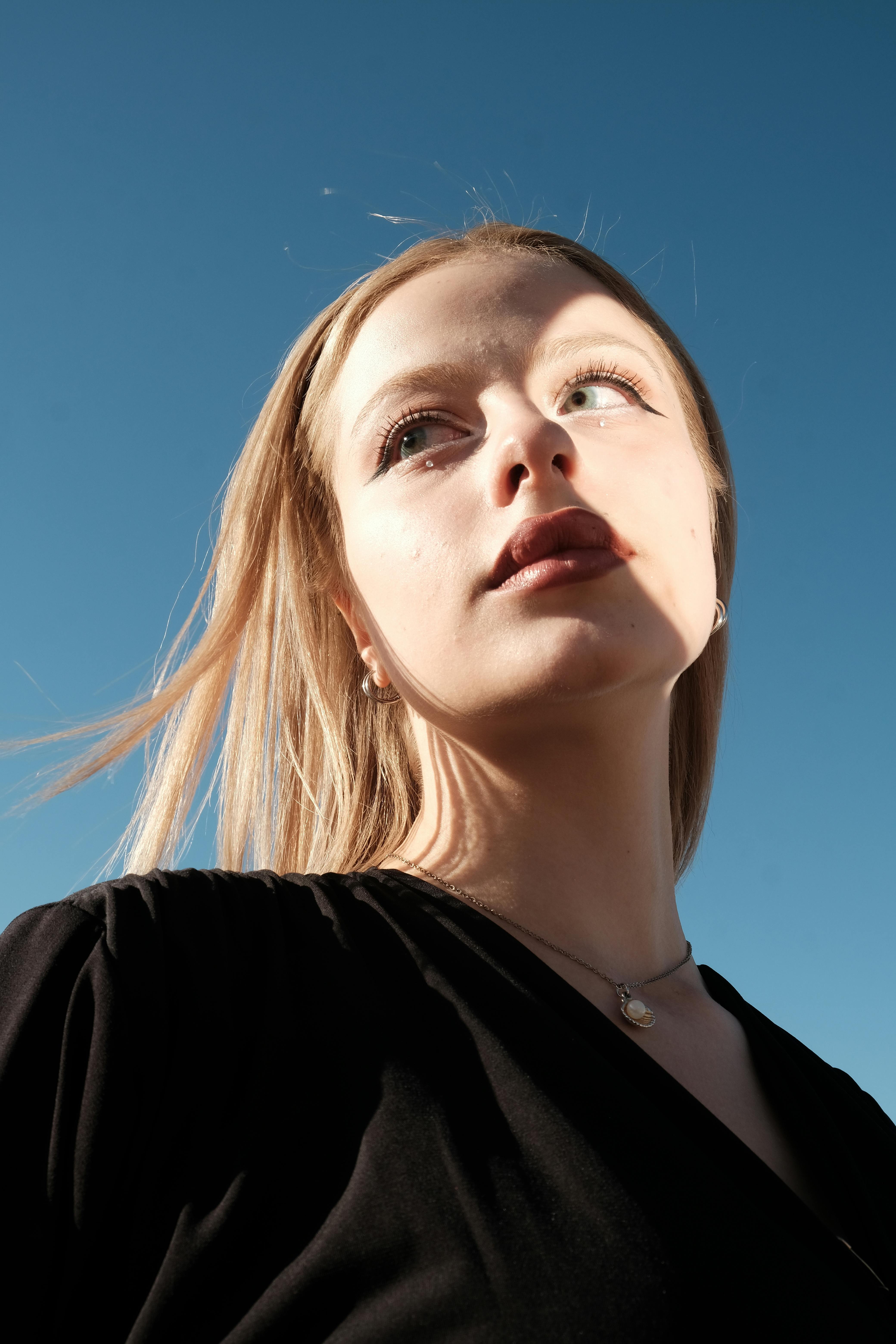 High-end editorial portrait for a fashion Framer e-commerce template, showcasing bold design and visual aesthetic.