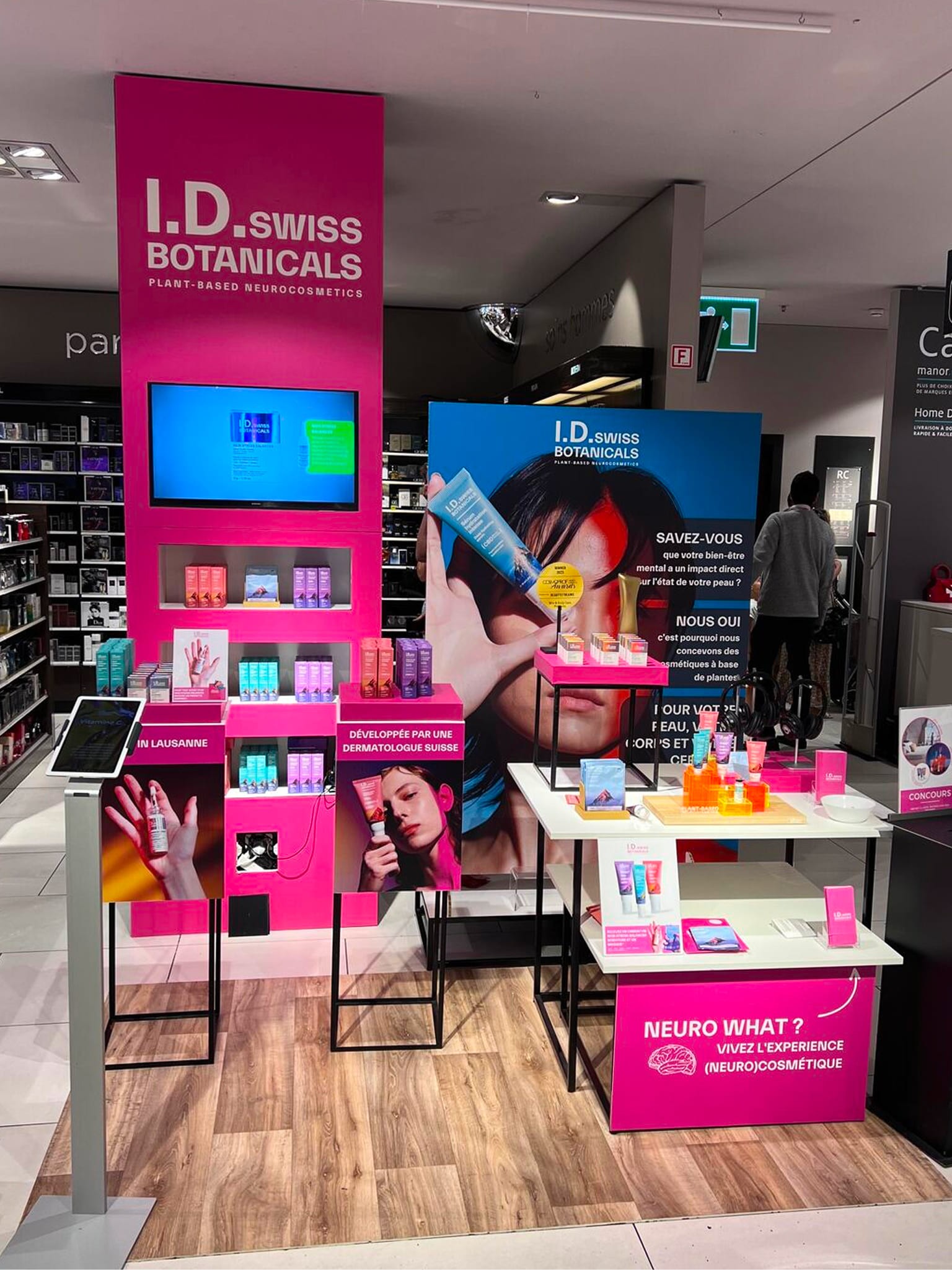 I.D. Swiss Botanicals retail display featuring product presentation and brand storytelling in physical store environment